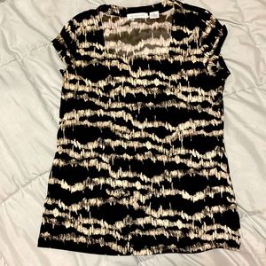 Cute black and white Liz Claiborne top. Fits well with wide square neck